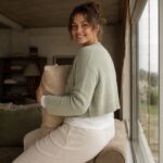 Linden cropped button cardigan — Knitted Cardigans by MOUDEST. worn by a model.