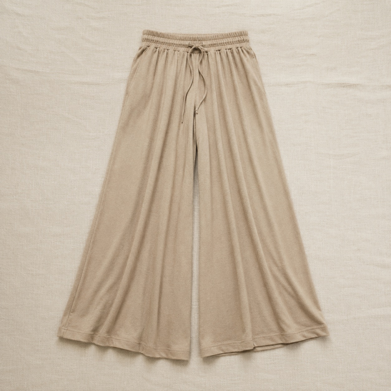 Hollington drawstring palazzo trouser — Lounge Trousers by MOUDEST. product photograph on a white background.